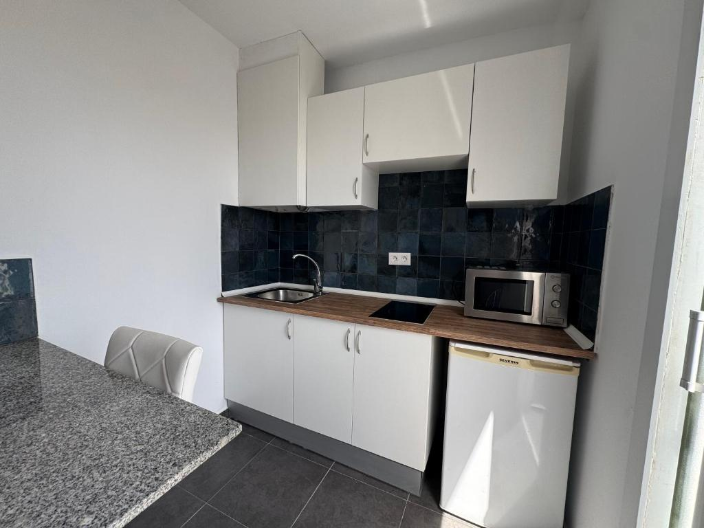 Cocina privada y zona de comedor del Apartamento Superior